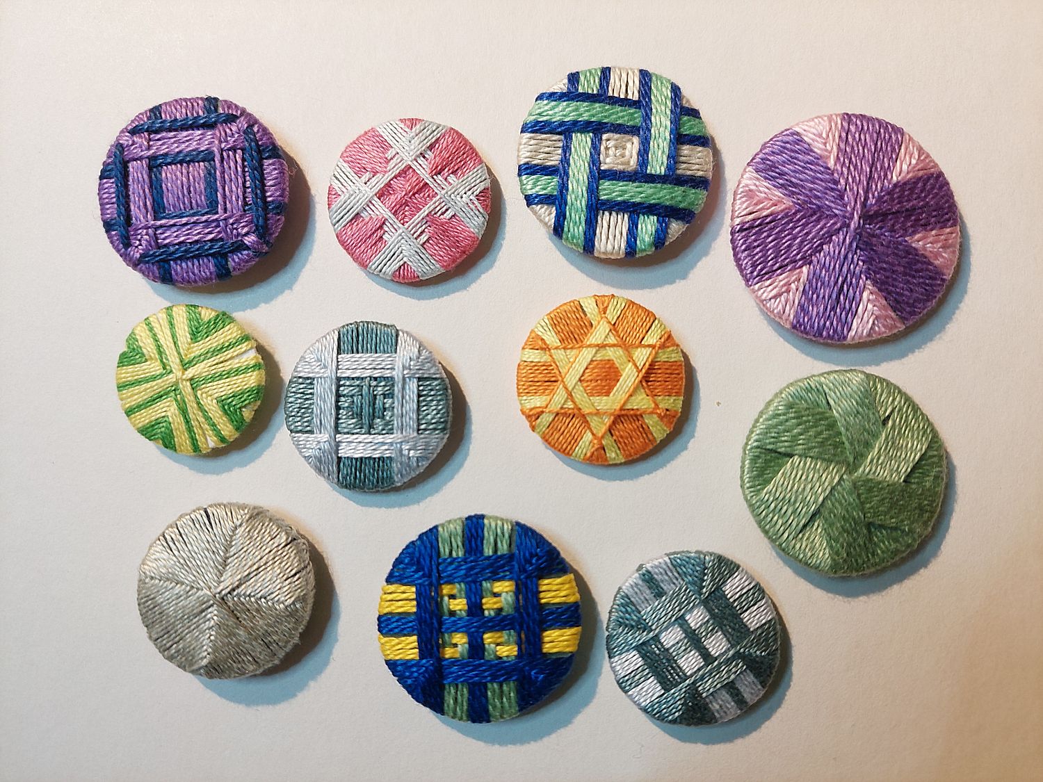 Thread wrapped buttons.  [Image is:  'Thread wrapped buttons'].