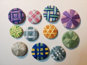 Thread wrapped buttons