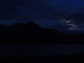 
	Moonlight at the end of our walk.  The shadowy
	hill across the loch is Beinn Damph.
	