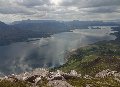 
	A wider view of Loch Torridon, with the outer Loch, and beyond to
	Skye;  wind-patterns were appearing on the Loch,
	and the cloud darkening, but
	this was as thick as it got all day 
	  