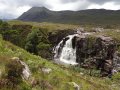 'Visit Torridon'.  [Image is:  'Talladale falls and Beinn an Eoin'].