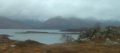 OK, here's one from the minibus:  Liathach (right, vague, skyline);  the near bay is Ob Mheallaidh, with Camas a' Chlàrsair (the harper's bay), beyond